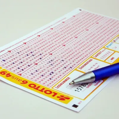 Lotto play slip and pen