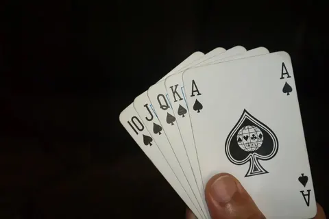 Hand holding playing cards