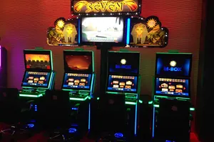 Online pokies: Row of pokie machines