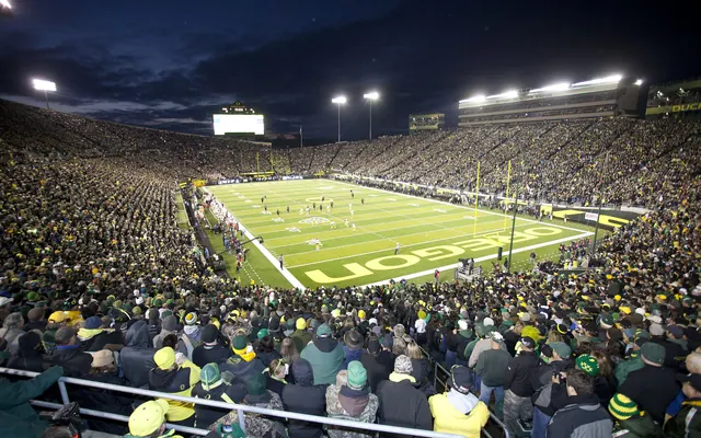 Floodlit stadium during a night game