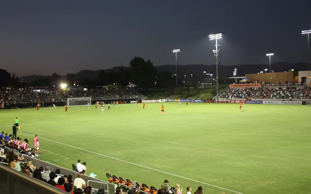 Football match in a stadium