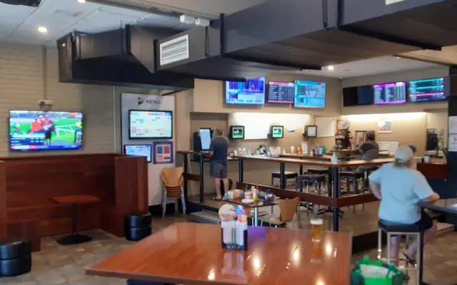 Betting shop with screens