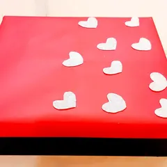 Gift box with paper hearts
