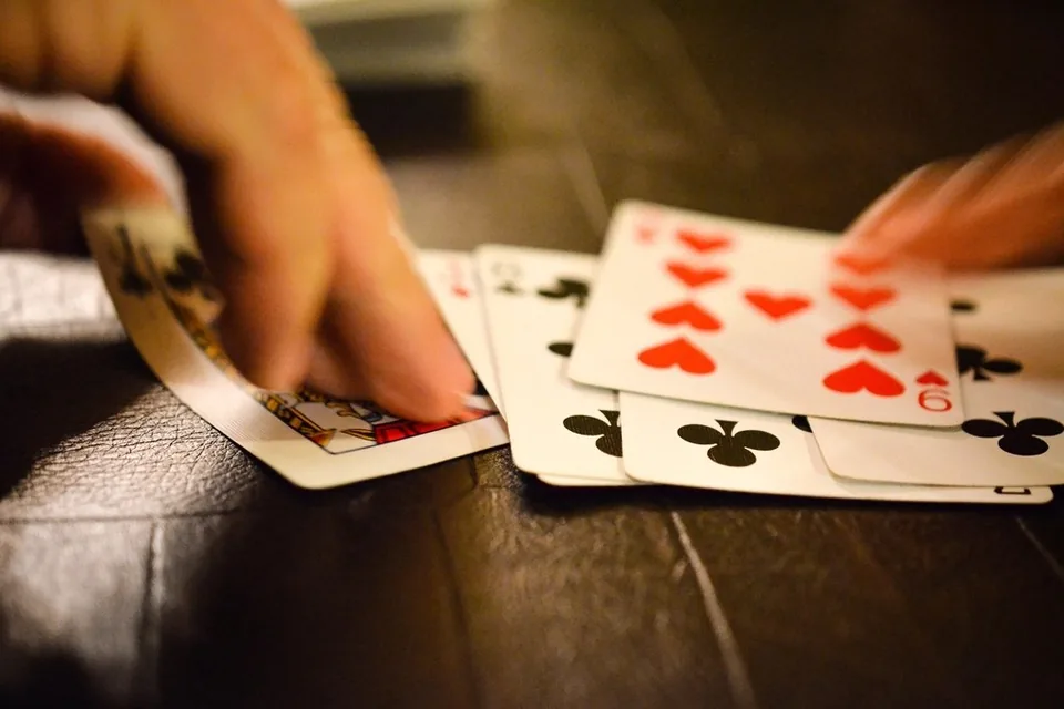 Cards squared up beside the deck