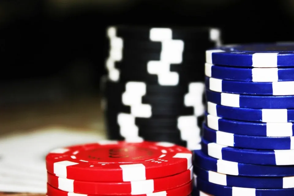 Chips counted out in front of a player