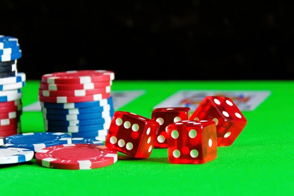 Chips and cash on the gaming table