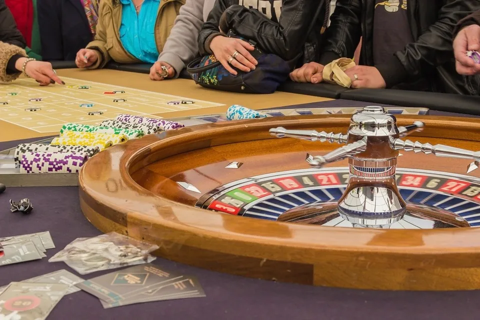 Players around a live casino table