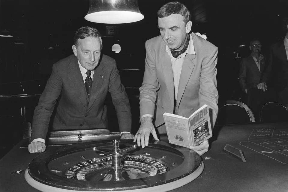 Players around a live casino table